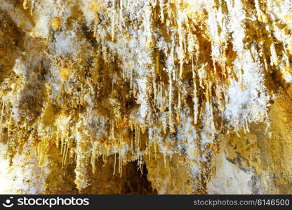 Many white stalactites inside of beautiful old cave. Grotte di Is Zuddas, Italy, Sardinia