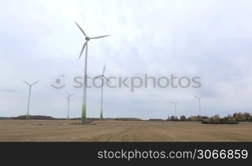 Many wind turbines in the field. Go green!