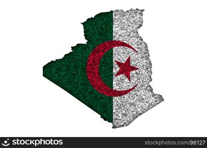 Map and flag of Algeria on poppy seeds