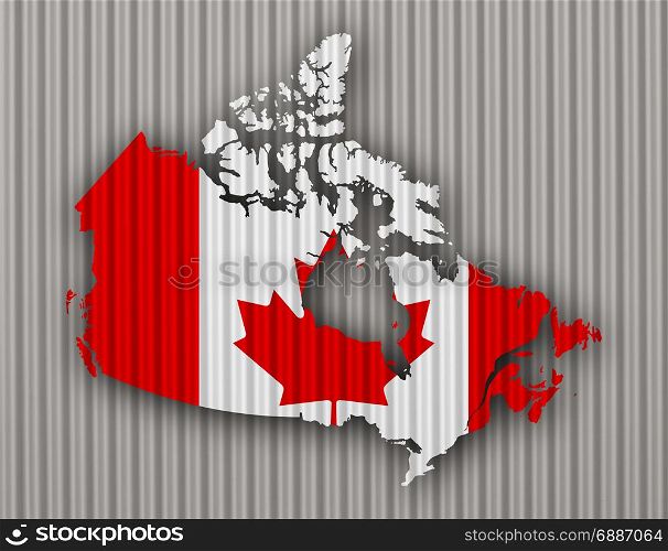 Map and flag of Canada on corrugated iron
