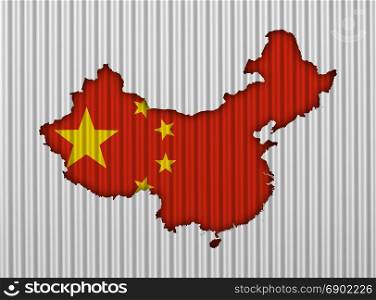 Map and flag of China on corrugated iron