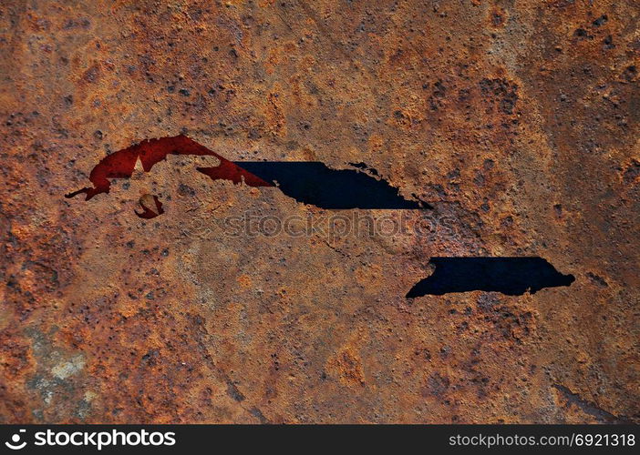 Map and flag of Cuba on rusty metal