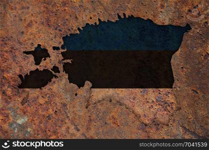 Map and flag of Estonia on rusty metal