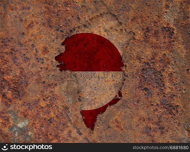 Map and flag of Greenland on rusty metal