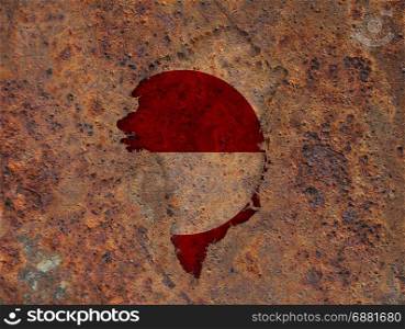Map and flag of Greenland on rusty metal