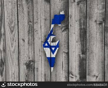 Map and flag of Israel on weathered wood