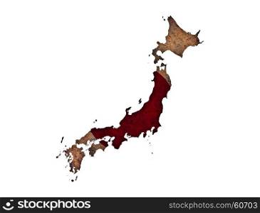 Map and flag of Japan on rusty metal