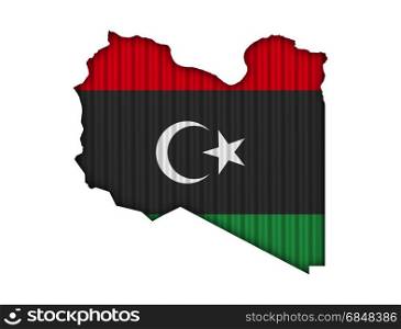 Map and flag of Libya on corrugated iron