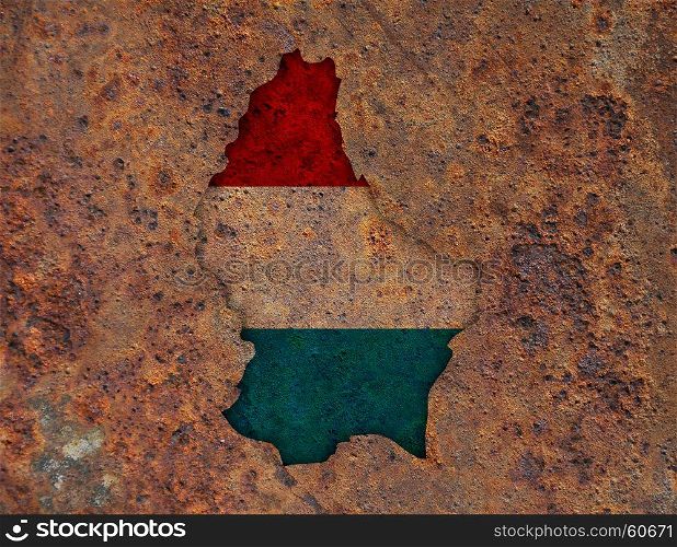 Map and flag of Luxembourg on rusty metal