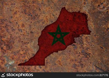 Map and flag of Morocco on rusty metal