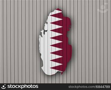 Map and flag of Qatar on corrugated iron