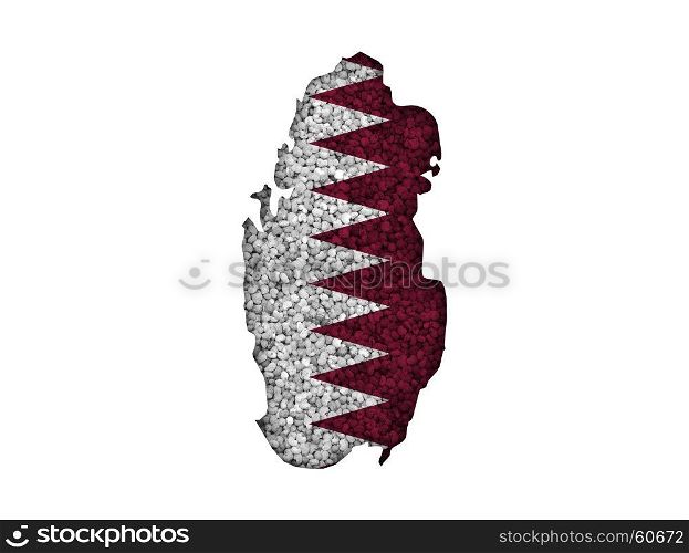Map and flag of Qatar on poppy seeds