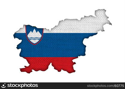 Map and flag of Slovenia on old linen