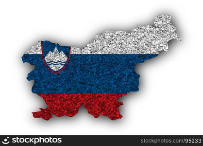 Map and flag of Slovenia on poppy seeds