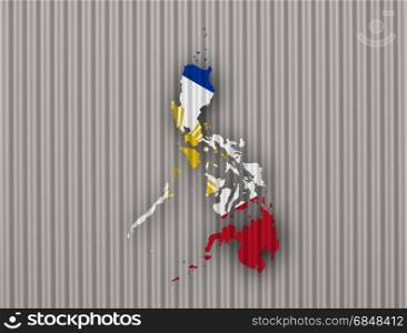 Map and flag of the Philippines on corrugated iron