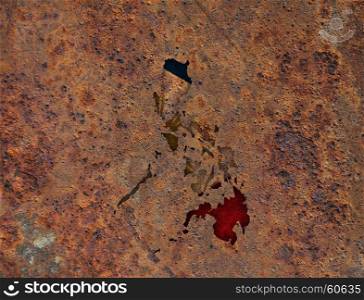 Map and flag of the Philippines on rusty metal