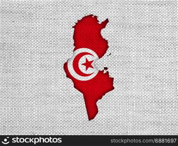 Map and flag of Tunisia on old linen