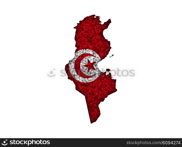 Map and flag of Tunisia on poppy seeds