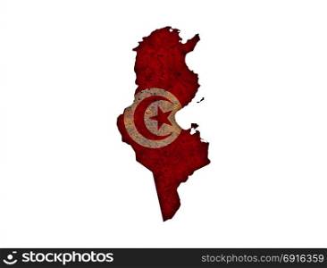 Map and flag of Tunisia on rusty metal