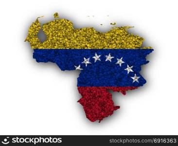 Map and flag of Venezuela on poppy seeds