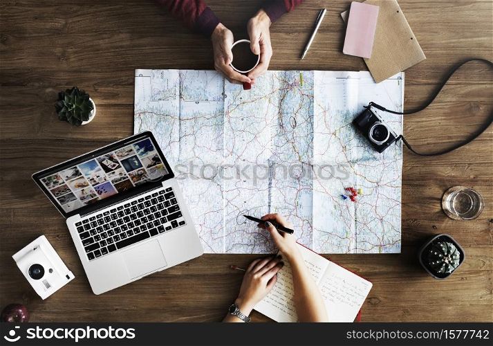 Map lying on wooden table