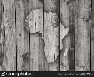 Map of Africa on weathered wood