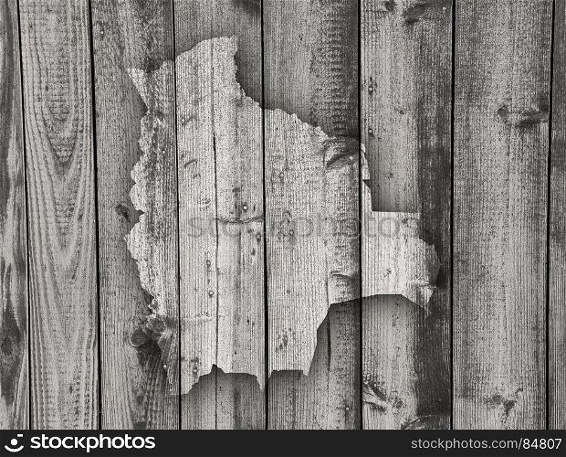 Map of Bolivia on weathered wood