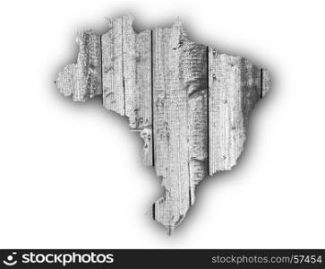 Map of Brazil on weathered wood