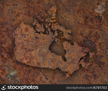 Map of Canada on rusty metal