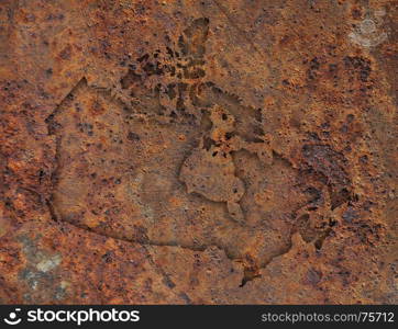 Map of Canada on rusty metal