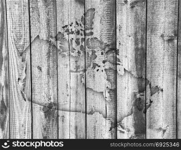 Map of Canada on weathered wood
