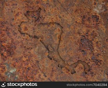Map of Central America on rusty metal