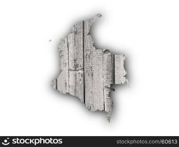 Map of Colombia on weathered wood