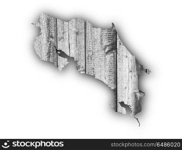 Map of Costa Rica on weathered wood