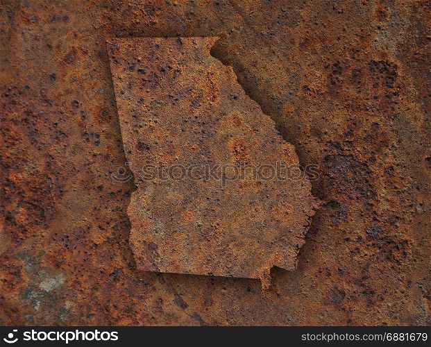 Map of Georgia on rusty metal