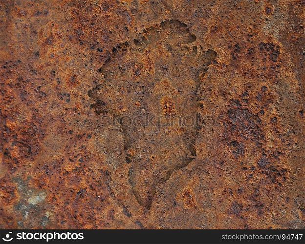 Map of Greenland on rusty metal
