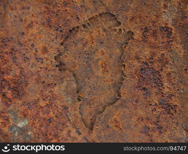 Map of Greenland on rusty metal