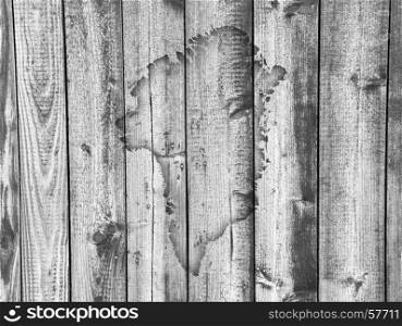 Map of Greenland on weathered wood