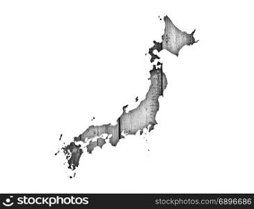 Map of Japan on weathered wood