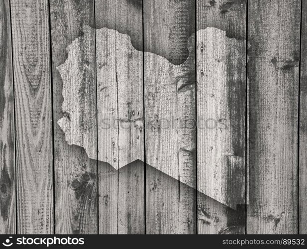 Map of Libya on weathered wood