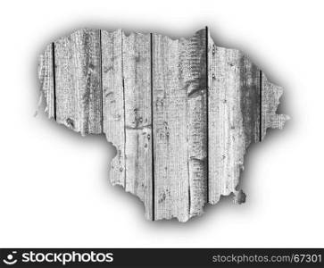 Map of Lithuania on weathered wood
