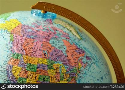 Map of North America on a globe.