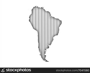 Map of South America on corrugated iron