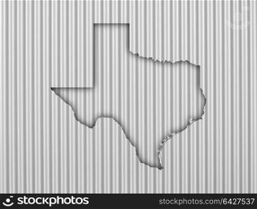 Map of Texas on corrugated iron