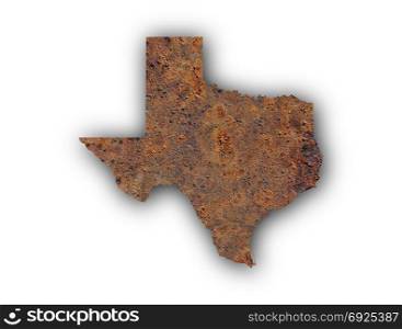 Map of Texas on rusty metal