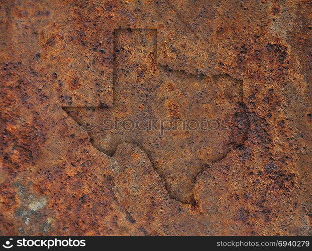 Map of Texas on rusty metal