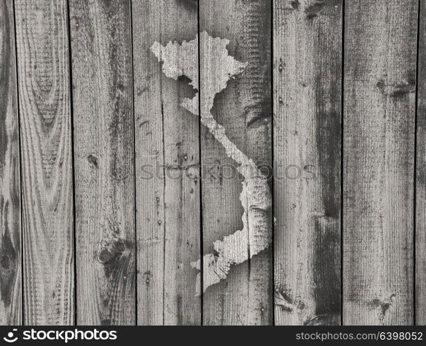 Map of Vietnam on weathered wood