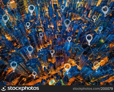 Map pin flat of city, global business and network connection lines. Aerial view of Hong Kong Downtown. Financial district in smart city, technology concept. Top view of skyscraper at night