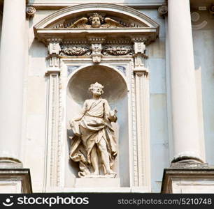 marble in old historical construction italy europe milan and statue