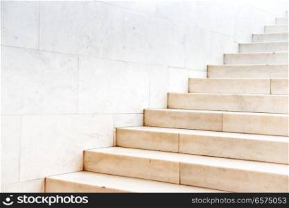 Marble staircase with stone stairs in building